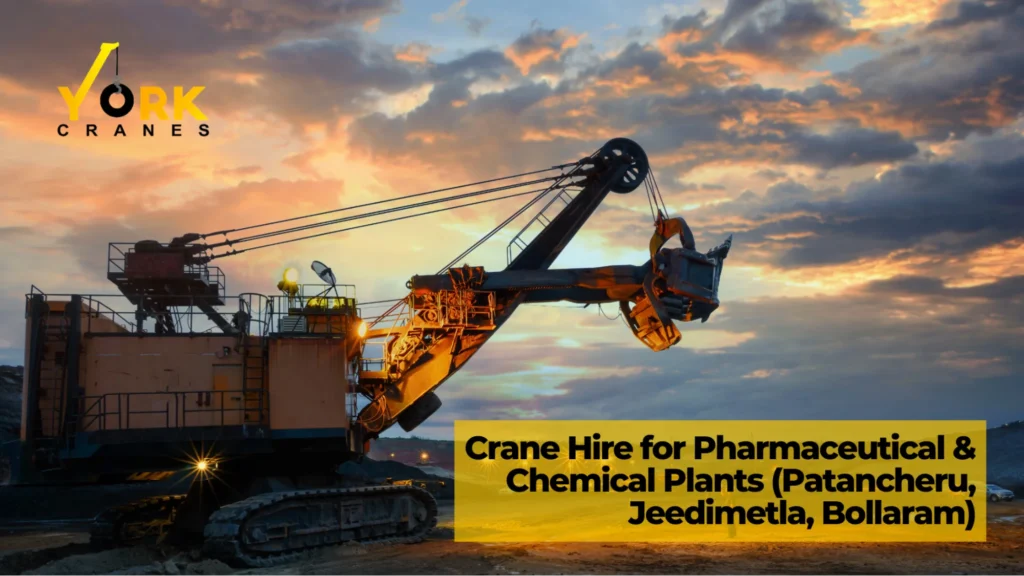 Mobile crane installing heavy industrial equipment at a pharmaceutical factory in Hyderabad during a factory installation project.