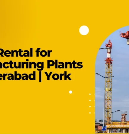 Industrial crane rental in Hyderabad lifting heavy machinery at a manufacturing plant for installation, maintenance and factory operations.